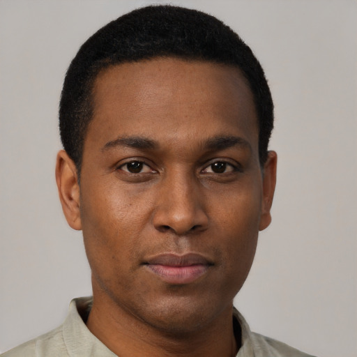 Neutral black young-adult male with short  black hair and brown eyes