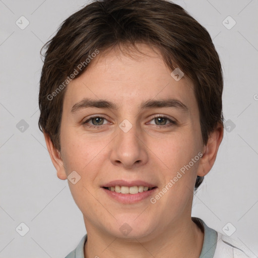 Joyful white young-adult female with short  brown hair and grey eyes