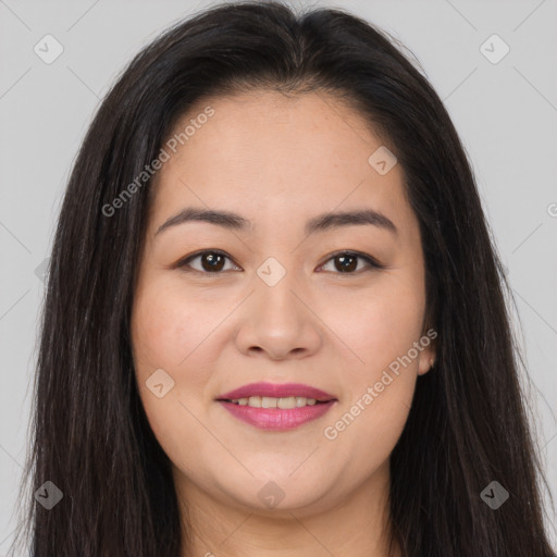 Joyful asian young-adult female with long  brown hair and brown eyes