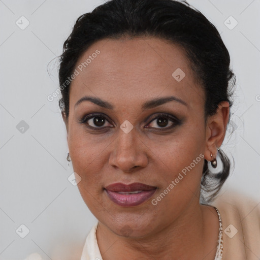 Joyful black young-adult female with short  brown hair and brown eyes