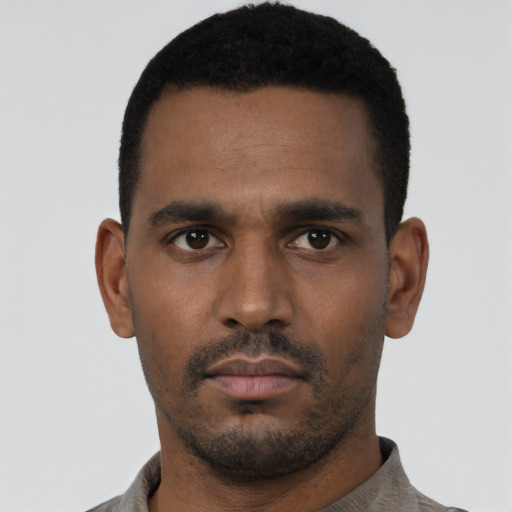 Neutral black young-adult male with short  black hair and brown eyes