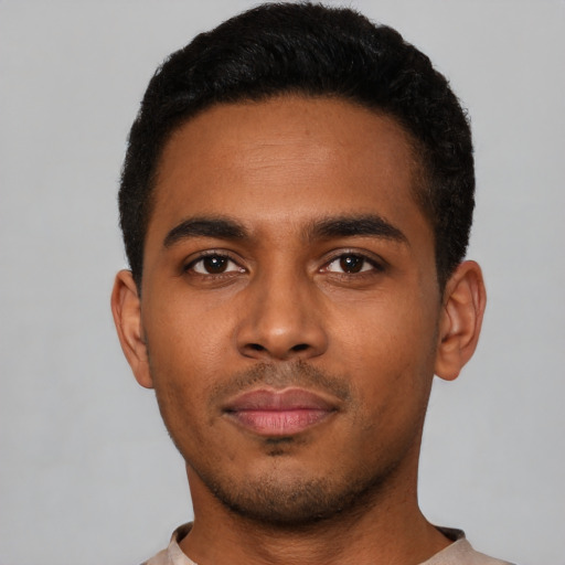 Neutral latino young-adult male with short  black hair and brown eyes