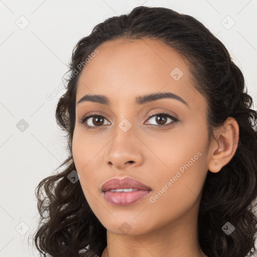 Joyful latino young-adult female with long  black hair and brown eyes