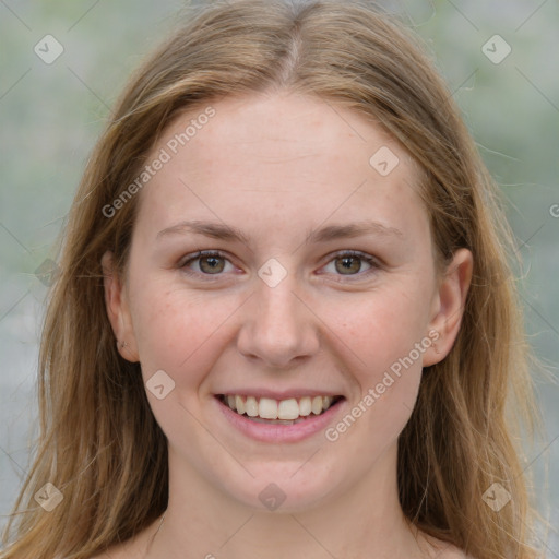 Joyful white young-adult female with long  brown hair and grey eyes