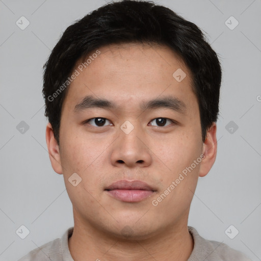 Neutral asian young-adult male with short  brown hair and brown eyes