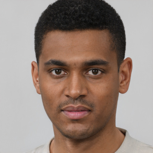 Neutral black young-adult male with short  black hair and brown eyes