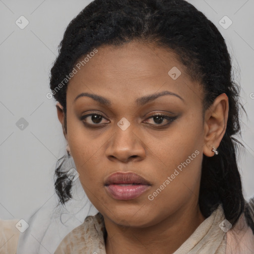 Joyful black young-adult female with medium  black hair and brown eyes