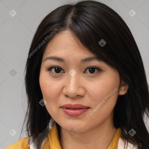 Joyful asian young-adult female with medium  brown hair and brown eyes