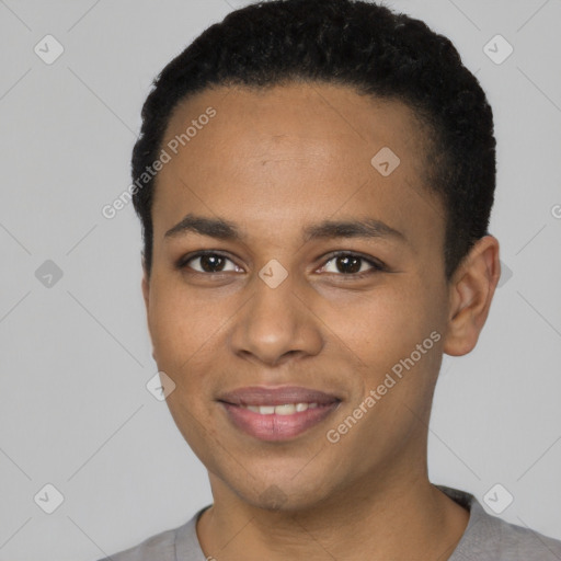 Joyful black young-adult male with short  black hair and brown eyes