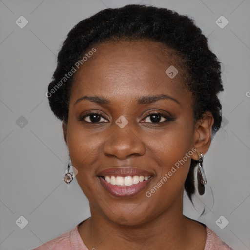 Joyful black young-adult female with medium  black hair and brown eyes