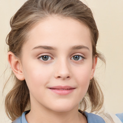 Joyful white child female with medium  brown hair and grey eyes