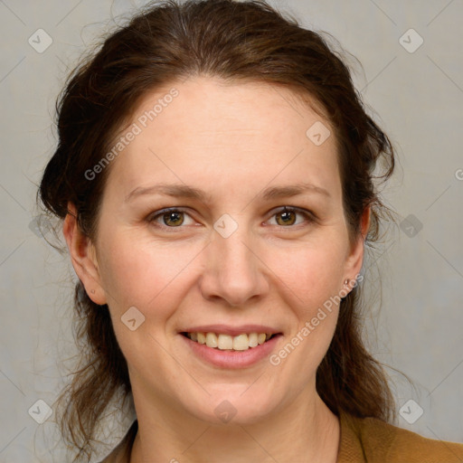 Joyful white adult female with medium  brown hair and grey eyes