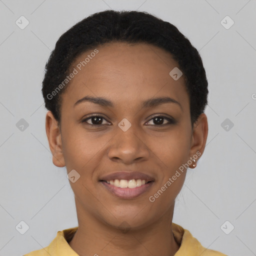 Joyful black young-adult female with short  brown hair and brown eyes