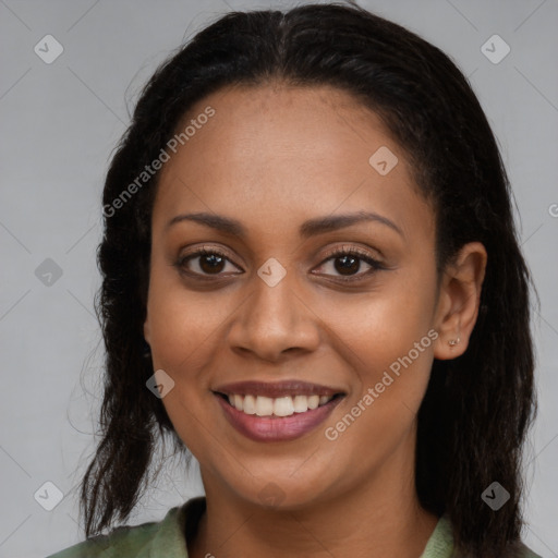 Joyful latino young-adult female with long  brown hair and brown eyes