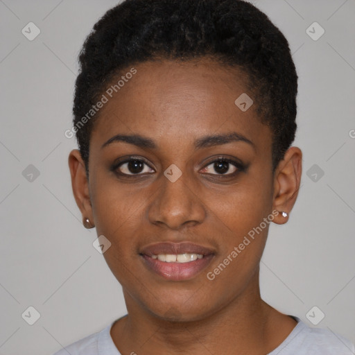 Joyful black young-adult female with short  black hair and brown eyes