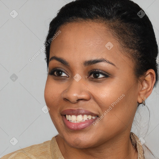 Joyful latino young-adult female with short  brown hair and brown eyes