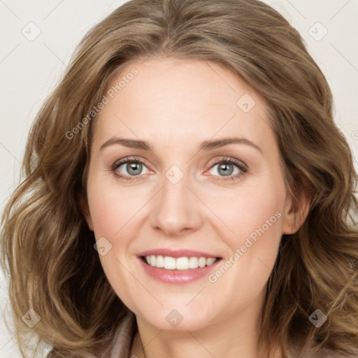 Joyful white young-adult female with medium  brown hair and green eyes