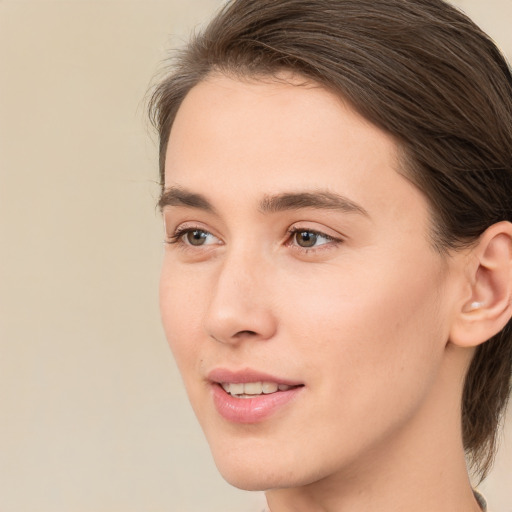 Joyful white young-adult male with medium  brown hair and brown eyes