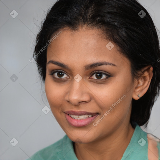 Joyful latino young-adult female with medium  brown hair and brown eyes