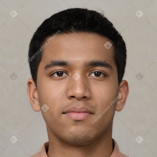 Neutral latino young-adult male with short  black hair and brown eyes