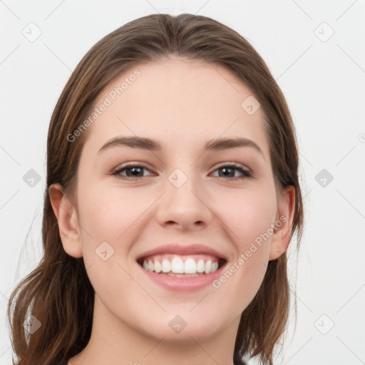 Joyful white young-adult female with long  brown hair and grey eyes