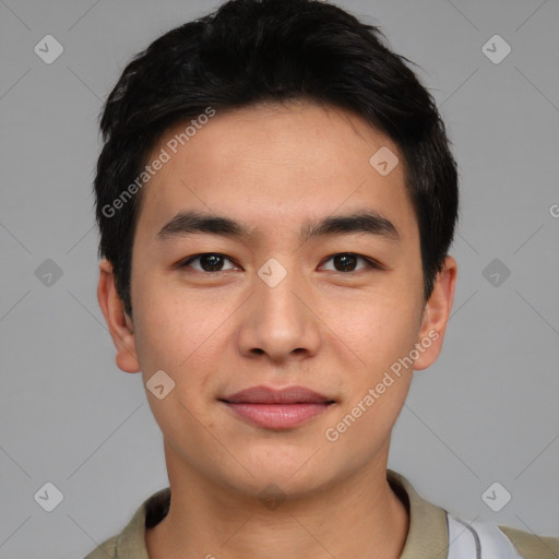 Joyful asian young-adult male with short  brown hair and brown eyes