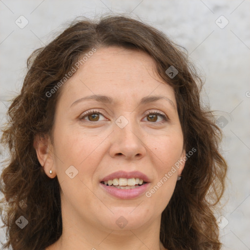 Joyful white adult female with medium  brown hair and green eyes