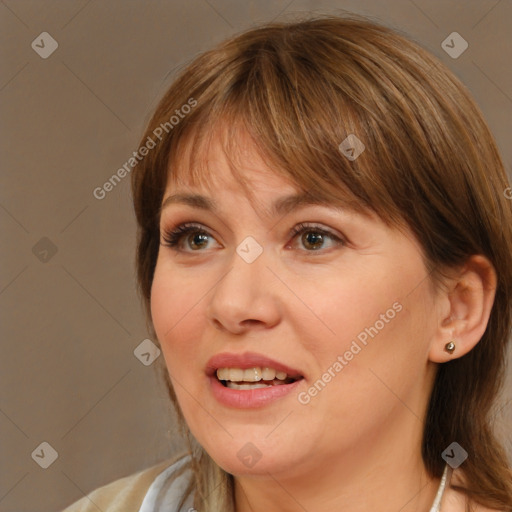 Joyful white adult female with medium  brown hair and brown eyes