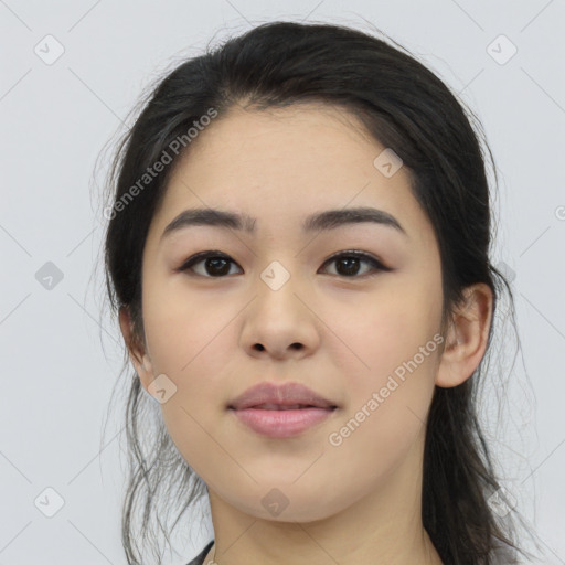 Joyful asian young-adult female with long  black hair and brown eyes