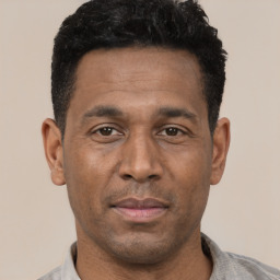 Neutral latino adult male with short  black hair and brown eyes