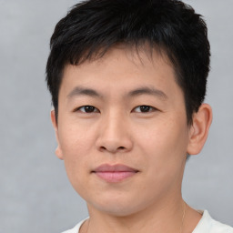 Neutral asian young-adult male with short  brown hair and brown eyes