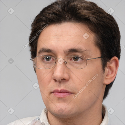 Neutral white adult male with short  brown hair and brown eyes