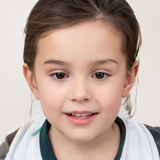 Joyful white child female with medium  brown hair and brown eyes