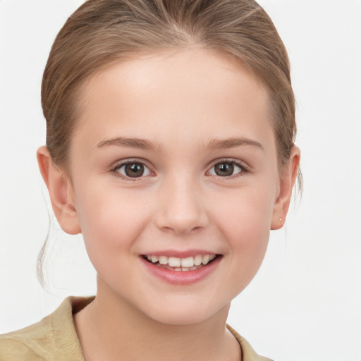 Joyful white child female with medium  brown hair and grey eyes