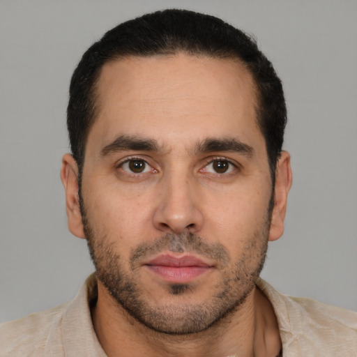 Neutral white young-adult male with short  black hair and brown eyes
