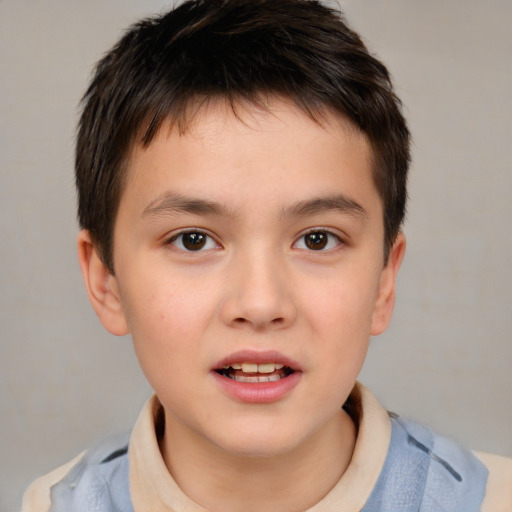 Joyful white child male with short  brown hair and brown eyes