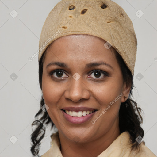 Joyful black young-adult female with medium  brown hair and brown eyes