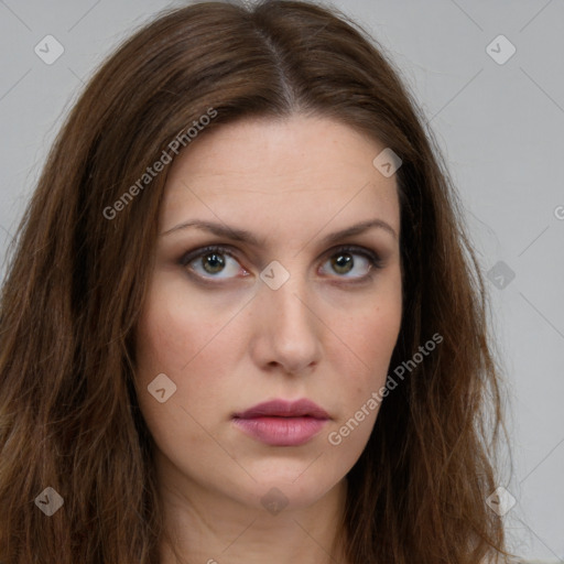 Neutral white young-adult female with long  brown hair and green eyes