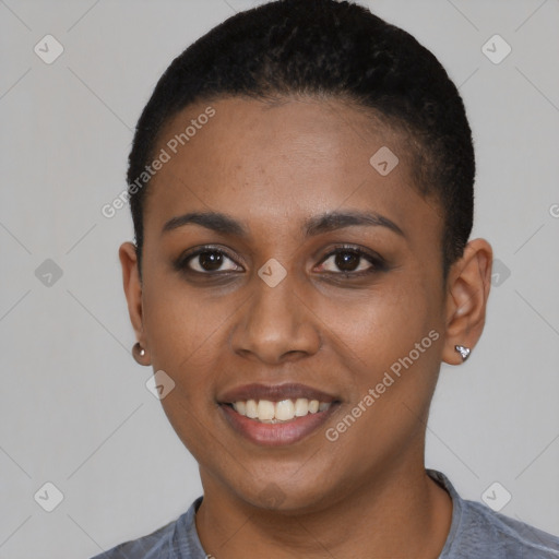 Joyful black young-adult female with short  black hair and brown eyes