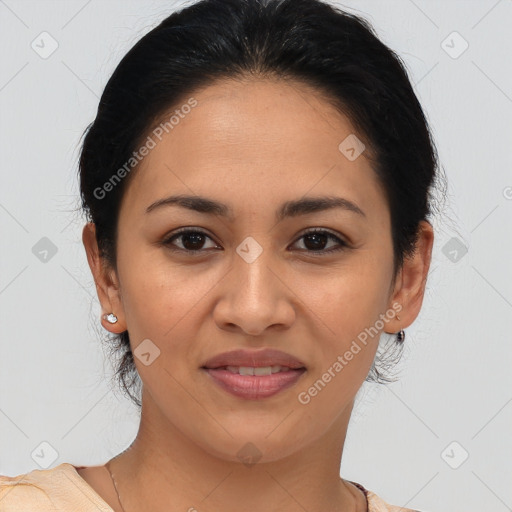 Joyful latino young-adult female with medium  brown hair and brown eyes