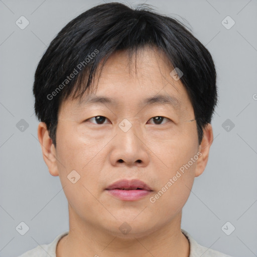 Neutral asian young-adult male with short  brown hair and brown eyes