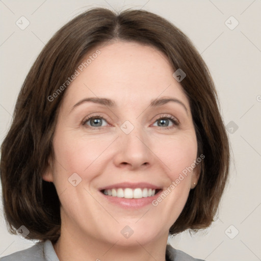 Joyful white young-adult female with medium  brown hair and green eyes