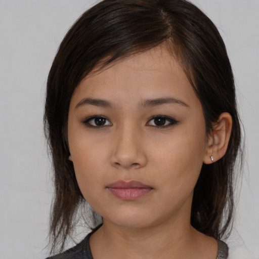 Neutral asian young-adult female with medium  brown hair and brown eyes