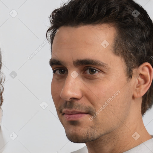 Neutral white young-adult male with short  brown hair and brown eyes