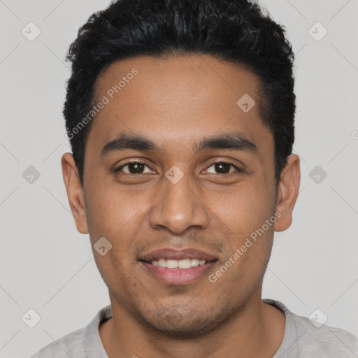 Joyful latino young-adult male with short  black hair and brown eyes