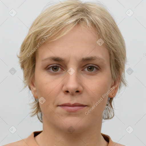 Joyful white adult female with medium  brown hair and grey eyes