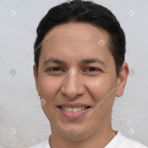 Joyful white adult male with short  brown hair and brown eyes