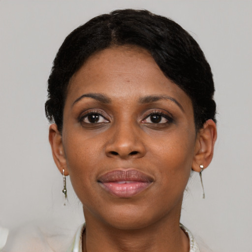 Neutral black adult female with short  brown hair and brown eyes