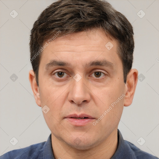 Neutral white adult male with short  brown hair and brown eyes