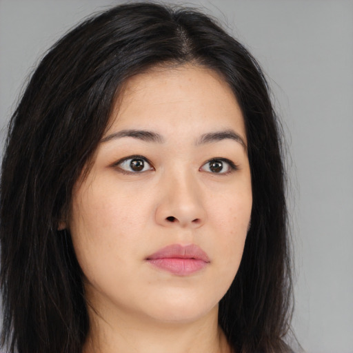 Neutral asian young-adult female with long  brown hair and brown eyes
